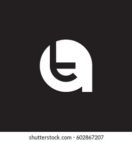 initial logo at, ta, t inside a rounded letter negative space logo white black background