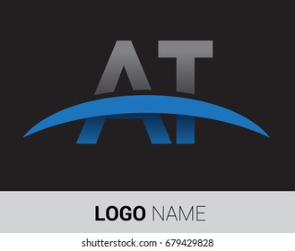 AT initial logo company name colored grey and blue swoosh design.