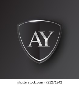 Initial logo letter AY with shield Icon silver color isolated on black background, logotype design for company identity.