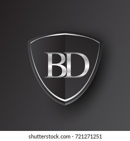 Initial logo letter BD with shield Icon silver color isolated on black background, logotype design for company identity.