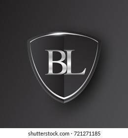 Initial logo letter BL with shield Icon silver color isolated on black background, logotype design for company identity.