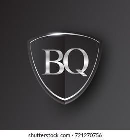 Initial logo letter BQ with shield Icon silver color isolated on black background, logotype design for company identity.