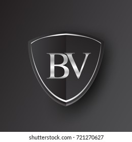 Initial logo letter BV with shield Icon silver color isolated on black background, logotype design for company identity.