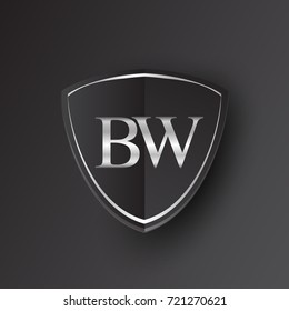 Initial logo letter BW with shield Icon silver color isolated on black background, logotype design for company identity.