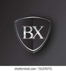 Initial logo letter BX with shield Icon silver color isolated on black background, logotype design for company identity.