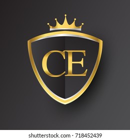 Initial logo letter CE with shield and crown Icon golden color isolated on black background, logotype design for company identity.
