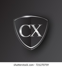 Initial logo letter CX with shield Icon silver color isolated on black background, logotype design for company identity