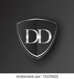 Initial logo letter DD with shield Icon silver color isolated on black background, logotype design for company identity.