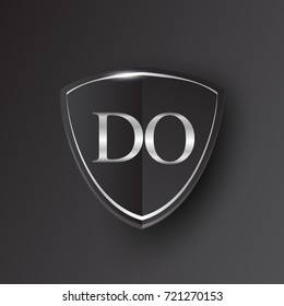 Initial logo letter DO with shield Icon silver color isolated on black background, logotype design for company identity.