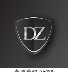 Initial logo letter DZ with shield Icon silver color isolated on black background, logotype design for company identity.