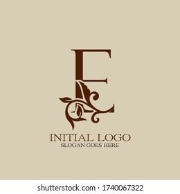 Initial logo letter E luxury style. Vintage nature floral Leaves concept logo design template