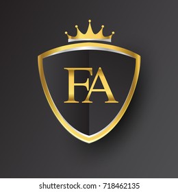 Initial logo letter FA with shield and crown Icon golden color isolated on black background, logotype design for company identity.