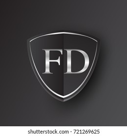 Initial logo letter FD with shield Icon silver color isolated on black background, logotype design for company identity.