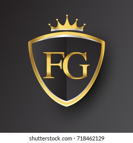 Initial logo letter FG with shield and crown Icon golden color isolated on black background, logotype design for company identity.