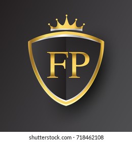 Initial logo letter FP with shield and crown Icon golden color isolated on black background, logotype design for company identity.