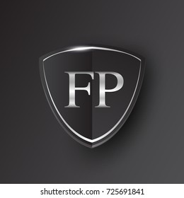 Initial logo letter FP with shield Icon silver color isolated on black background, logotype design for company identity.