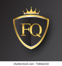 Initial logo letter FQ with shield and crown Icon golden color isolated on black background, logotype design for company identity.