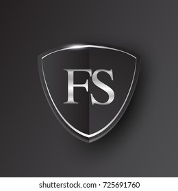 Initial logo letter FS with shield Icon silver color isolated on black background, logotype design for company identity.