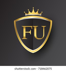 Initial logo letter FU with shield and crown Icon golden color isolated on black background, logotype design for company identity.