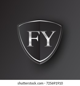 Initial logo letter FY with shield Icon silver color isolated on black background, logotype design for company identity.