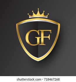 Initial logo letter GF with shield and crown Icon golden color isolated on black background, logotype design for company identity.