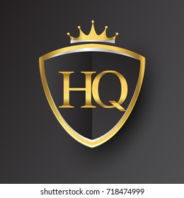 Initial logo letter HQ with shield and crown Icon golden color isolated on black background, logotype design for company identity.