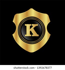 initial logo letter K. gold shield
