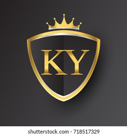 Initial logo letter KY with shield and crown Icon golden color isolated on black background, logotype design for company identity.