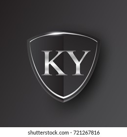 Initial logo letter KY with shield Icon silver color isolated on black background, logotype design for company identity.