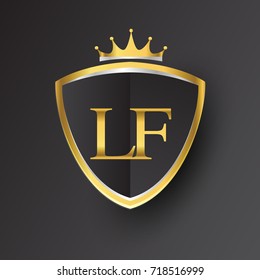 Initial logo letter LF with shield and crown Icon golden color isolated on black background, logotype design for company identity.