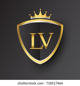 Initial logo letter LV with shield and crown Icon golden color isolated on black background, logotype design for company identity.