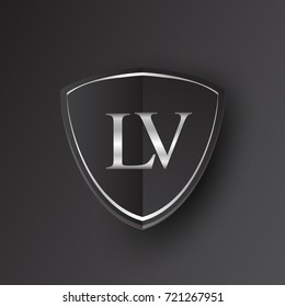 Initial logo letter LV with shield Icon silver color isolated on black background, logotype design for company identity.