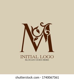 Initial logo letter M luxury style. Vintage nature floral Leaves concept logo design template