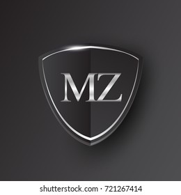 Initial logo letter MZ with shield Icon silver color isolated on black background, logotype design for company identity.