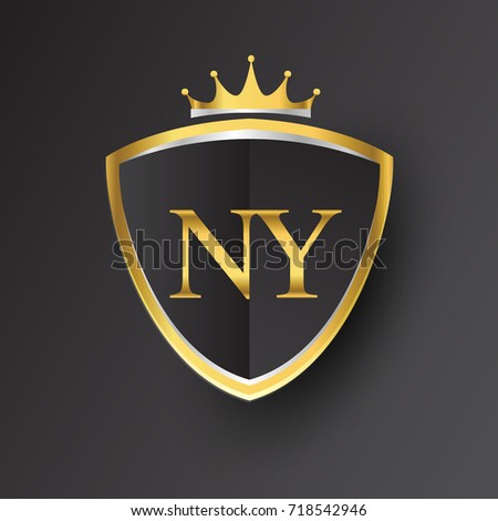Initial logo letter NY with shield and crown Icon golden color isolated on black background, logotype design for company identity.