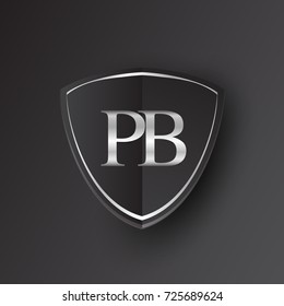 Initial logo letter PB with shield Icon silver color isolated on black background, logotype design for company identity.