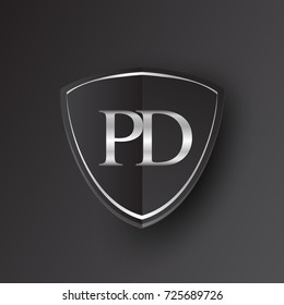 Initial logo letter PD with shield Icon silver color isolated on black background, logotype design for company identity.