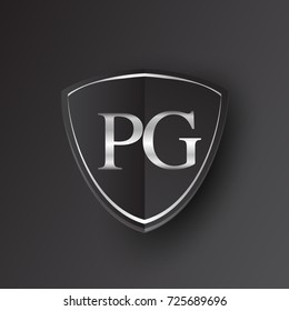 Initial logo letter PG with shield Icon silver color isolated on black background, logotype design for company identity.