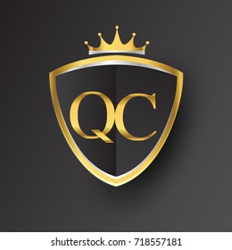 Initial logo letter QC with shield and crown Icon golden color isolated on black background, logotype design for company identity.