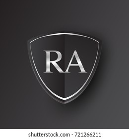 Initial logo letter RA with shield Icon silver color isolated on black background, logotype design for company identity.