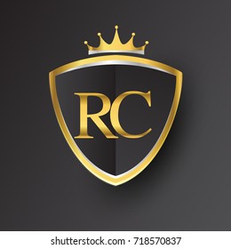 Initial logo letter RC with shield and crown Icon golden color isolated on black background, logotype design for company identity.