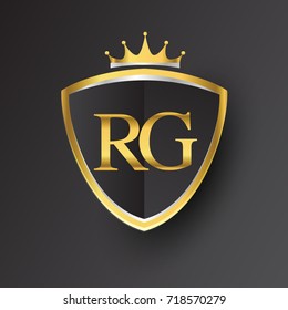 Initial logo letter RG with shield and crown Icon golden color isolated on black background, logotype design for company identity.