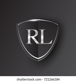 Initial logo letter RL with shield Icon silver color isolated on black background, logotype design for company identity.