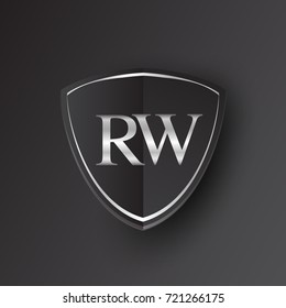 Initial logo letter RW with shield Icon silver color isolated on black background, logotype design for company identity.