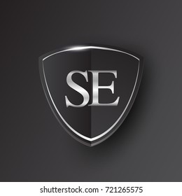 Initial logo letter SE with shield Icon silver color isolated on black background, logotype design for company identity.