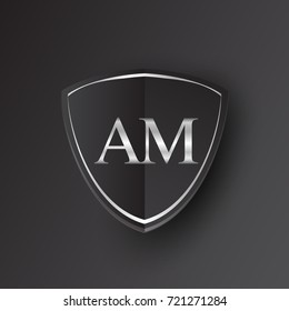Initial logo letter AM with shield Icon silver color isolated on black background, logotype design for company identity.