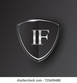 Initial logo letter IF with shield Icon silver color isolated on black background, logotype design for company identity.