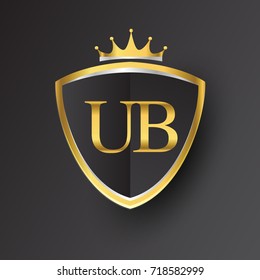 Initial logo letter UB with shield and crown Icon golden color isolated on black background, logotype design for company identity.