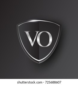 Initial logo letter VO with shield Icon silver color isolated on black background, logotype design for company identity.