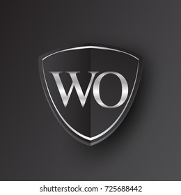 Initial logo letter WO with shield Icon silver color isolated on black background, logotype design for company identity.